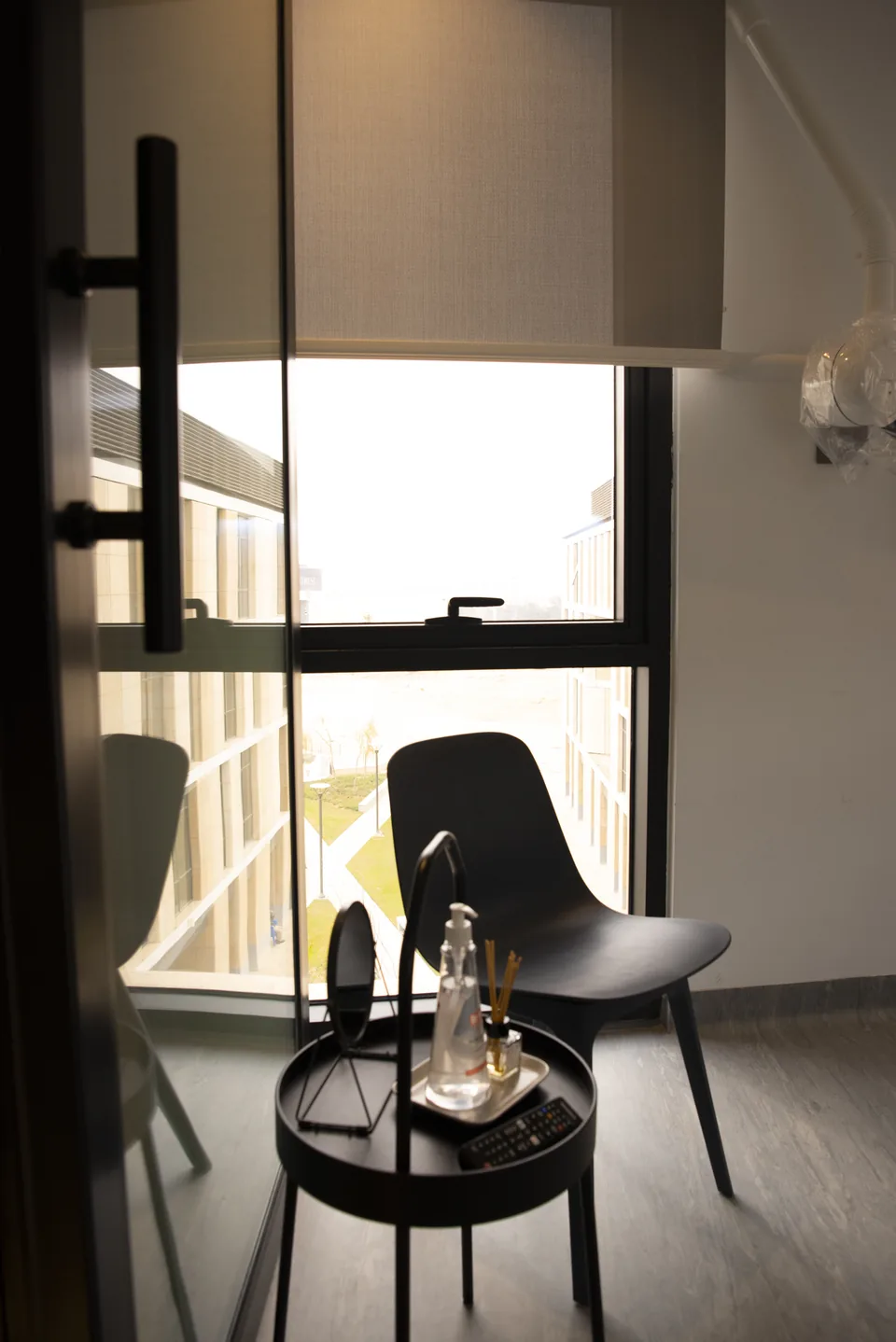A quiet seating corner beside a window at the clinic